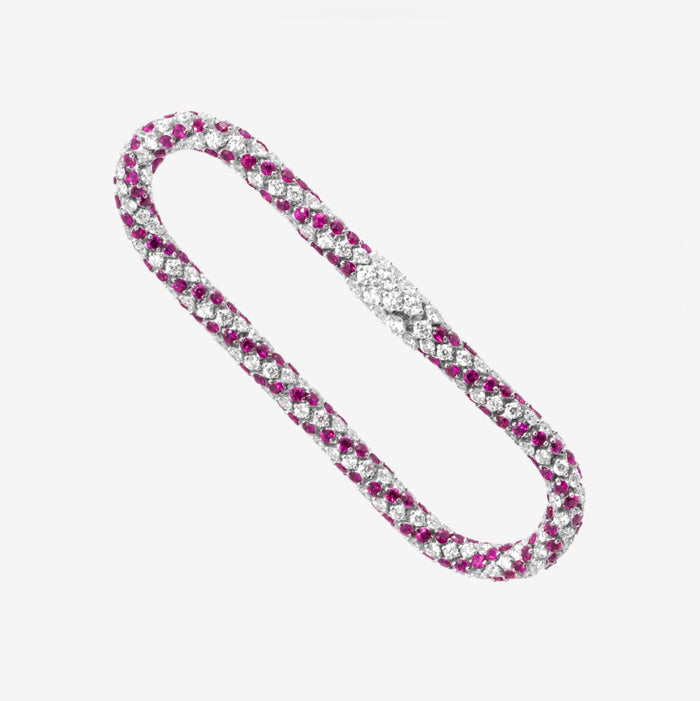 Großes Schlangenarmband mit Diamanten und Rubinen